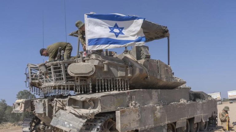 Israel sends tanks into West Bank, orders troops to remain